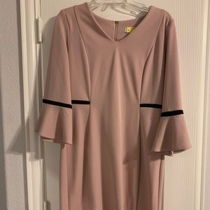 Pink long sleeve knee length dress with black piping and flowy sleeves size 10.